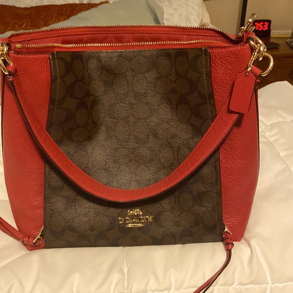 Red and brown coach bag